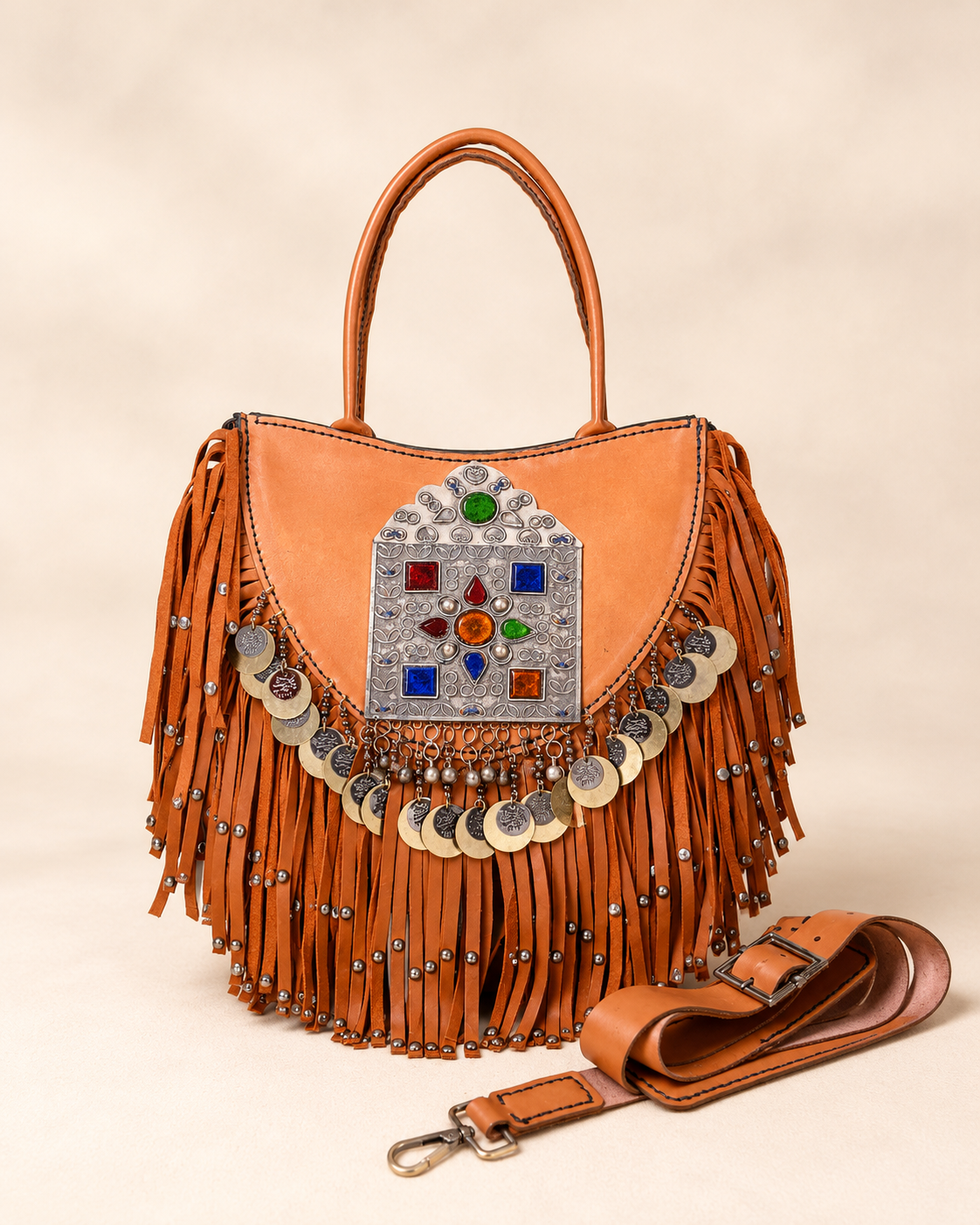Front view of Sultara Bag in genuine leather with stained glass brass centerpiece and tassels